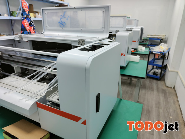 DTF transfer Printer with PET transferred film with Fluorecent green and orange printing