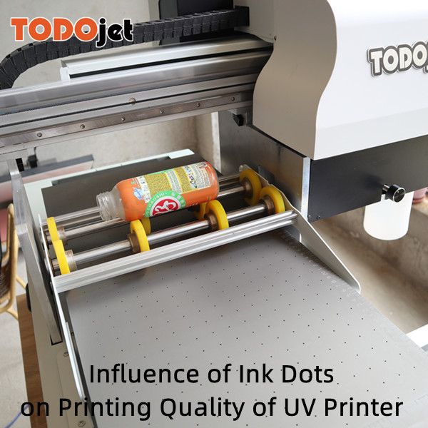 Influenza di i punti d'inchiostro nantu à a qualità di stampa di a stampante UV