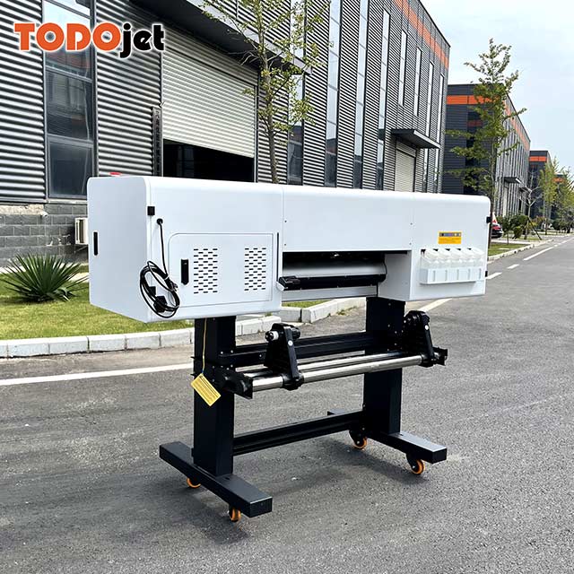 Hot in Spain Professional Senior cmykw dtf printer 65cm pet film kits shake powder cotton fabric t-shirt printing machine